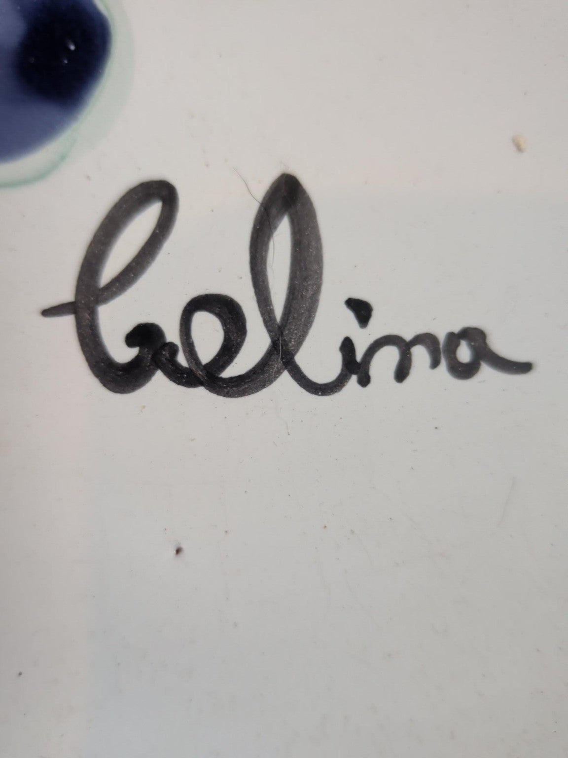 Belina signature on hand-painted serving platter
