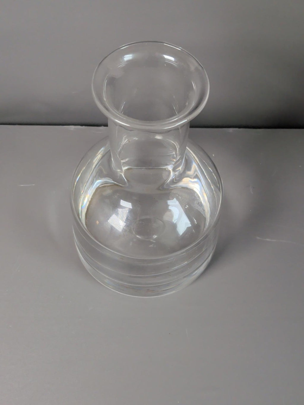 Clear glass carafe top and heavy base