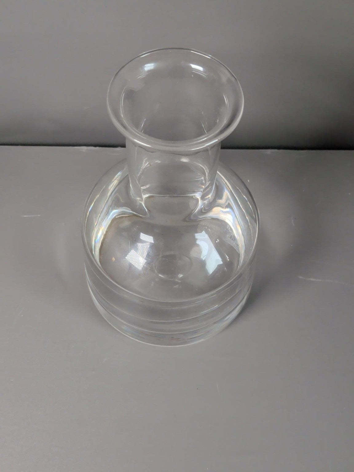 Clear glass carafe top and heavy base