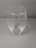 Clear rounded glass vase with heavy base