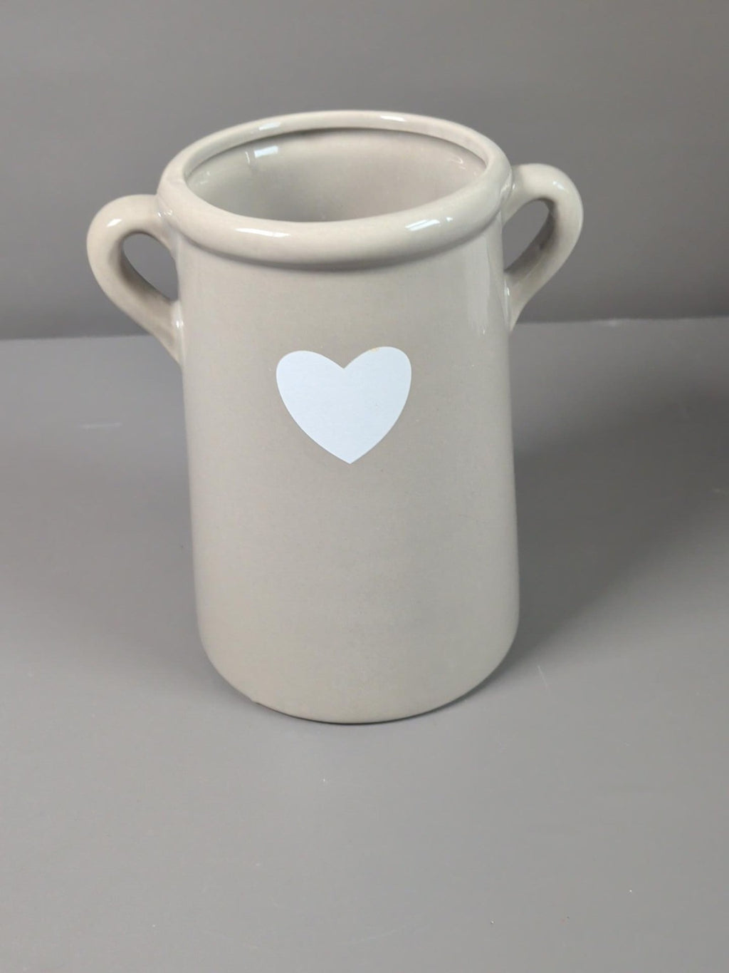 Cream ceramic two handled pot with white heart