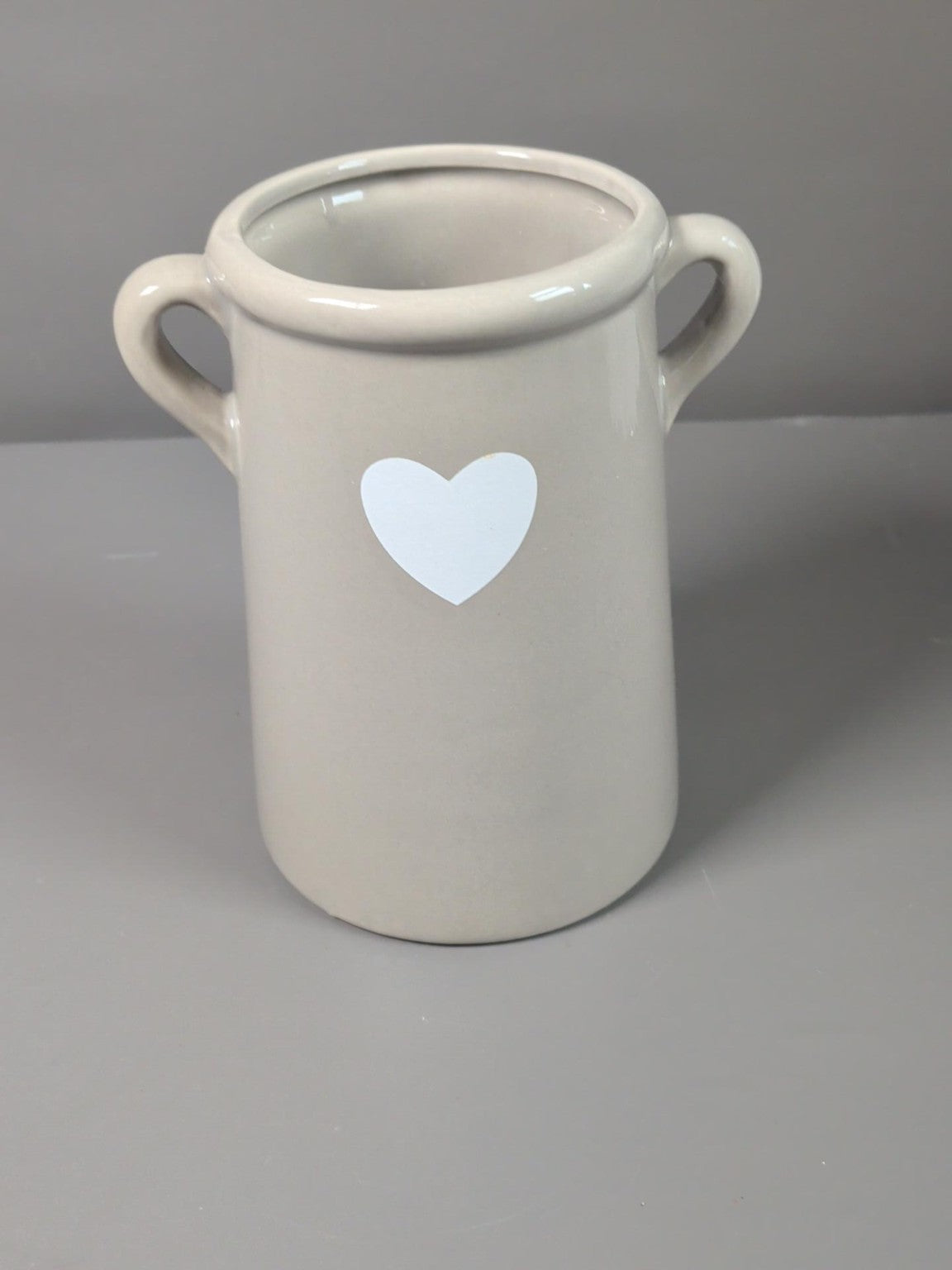 Cream ceramic two handled pot with white heart