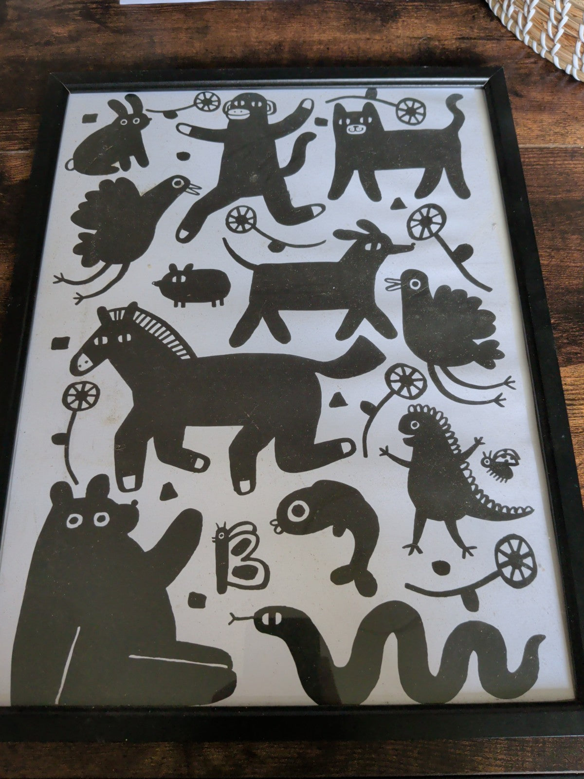 Framed black and white abstract animal print wall art