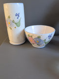 Matching hand-painted floral pottery vase and bowl