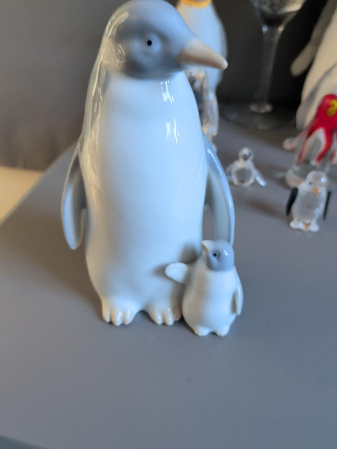 John Jenkins adult penguin with chick