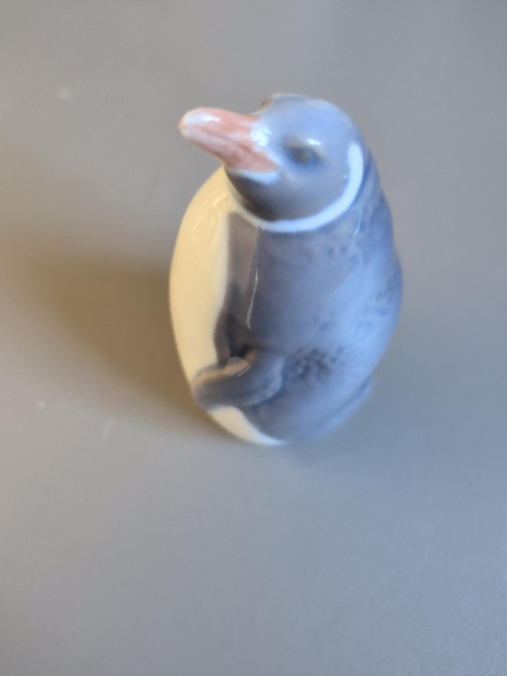 Penguin figurine other side