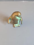 Small solid metal penguin front