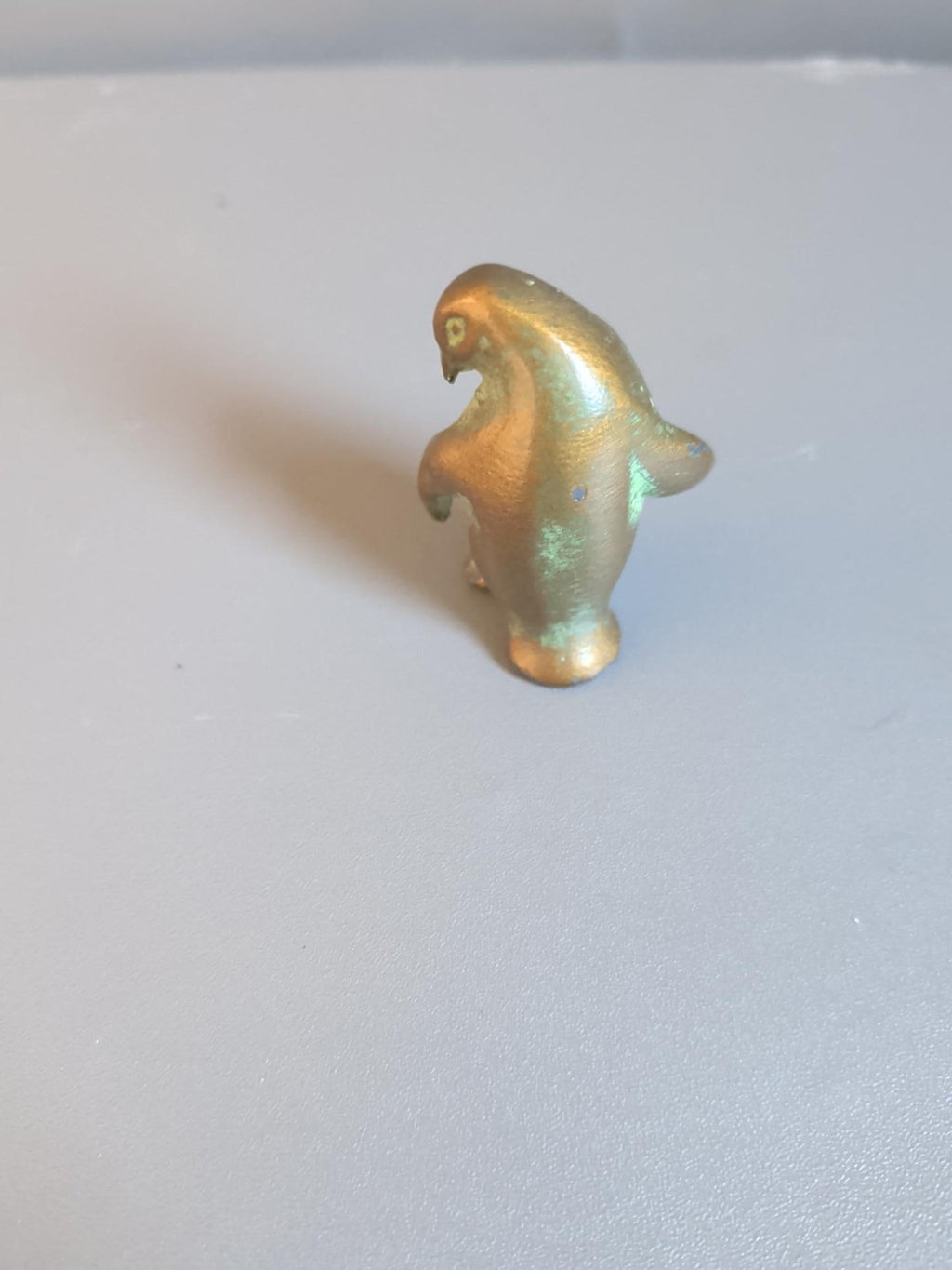 Metal penguin side view