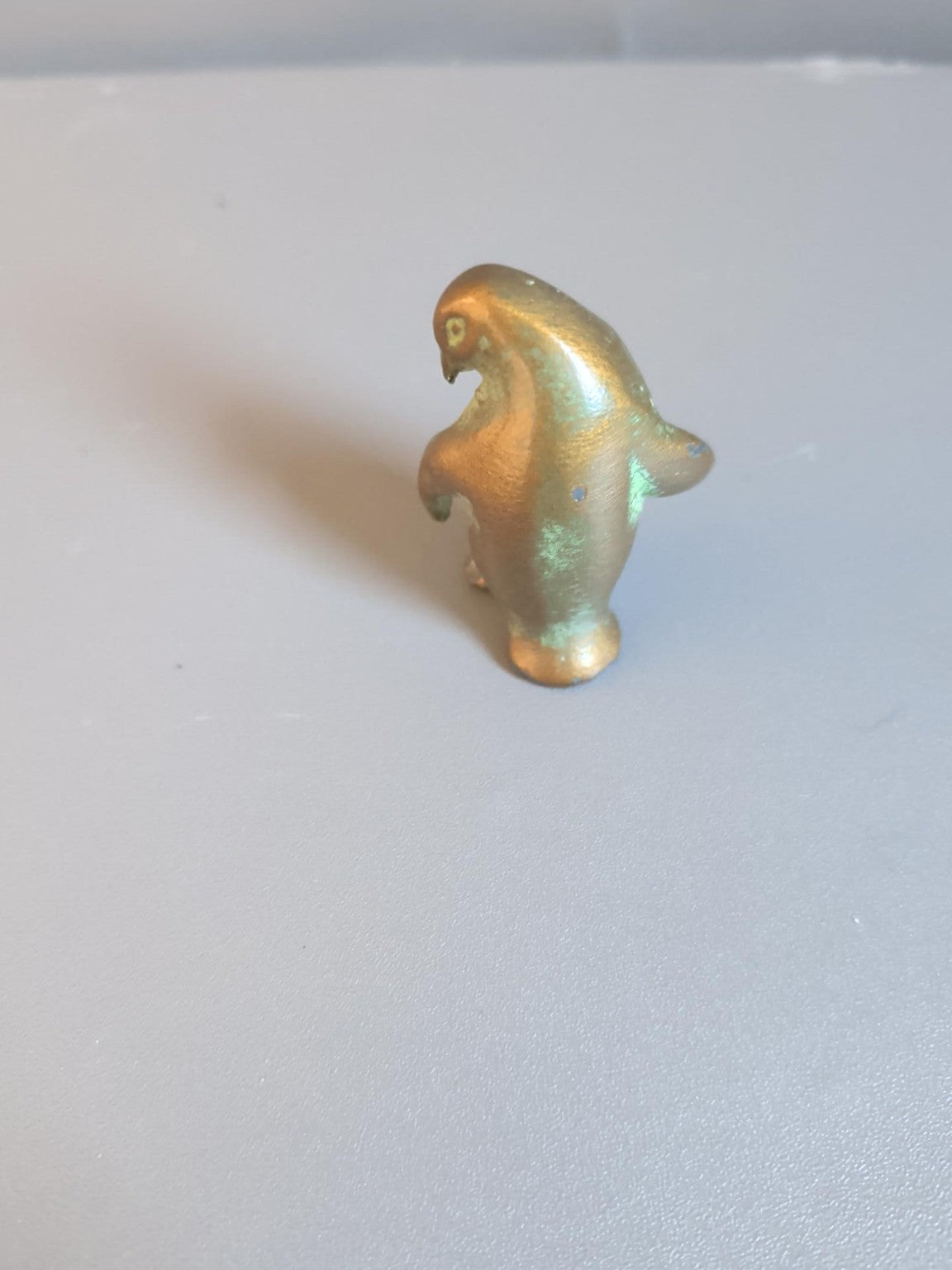 Metal penguin side view