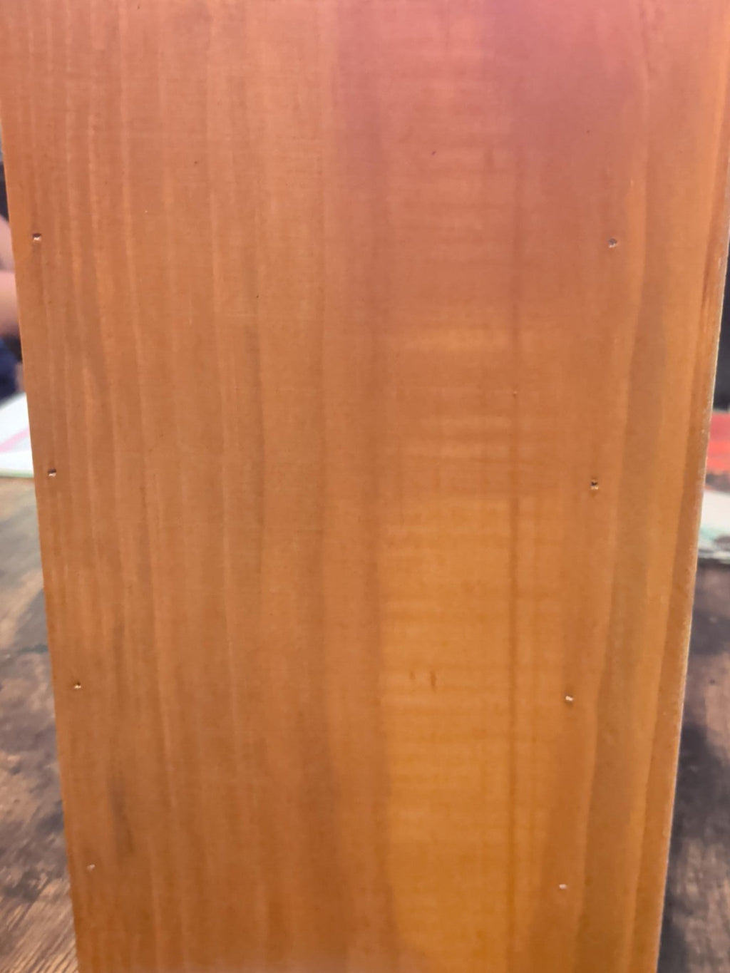 Side of wooden storage chest