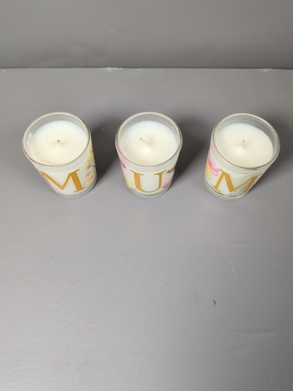 MUM floral glass votive candles top view