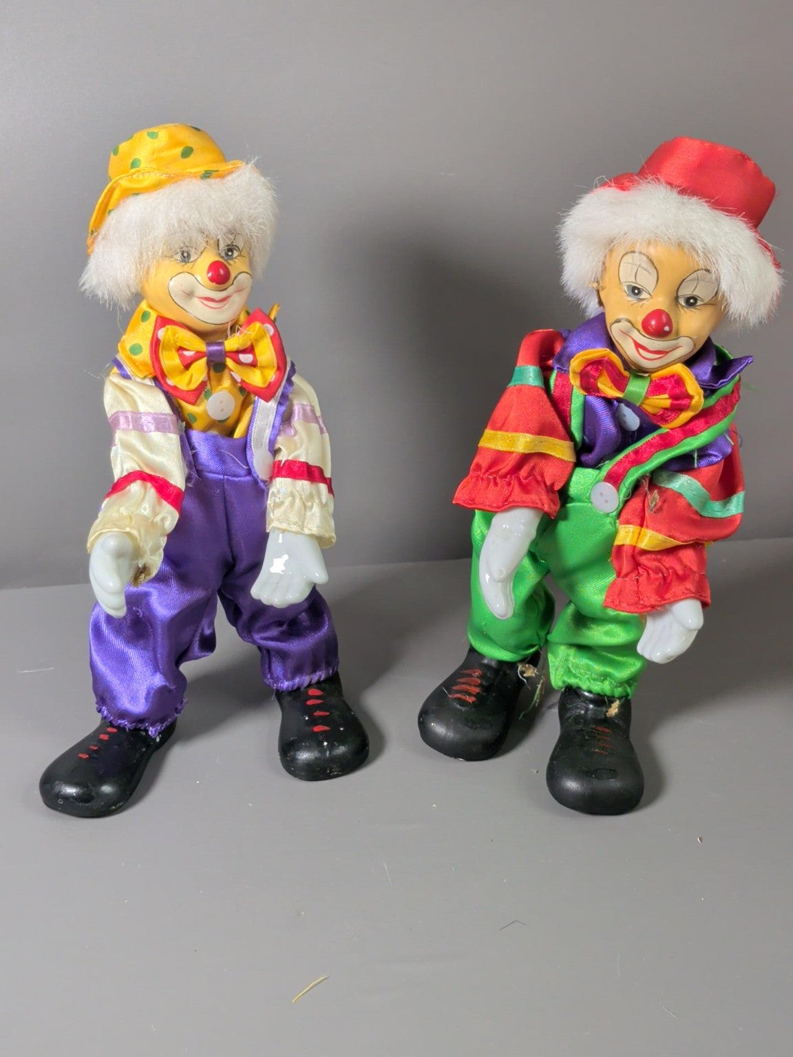 Pair of vintage colourful clown dolls - condition and detail