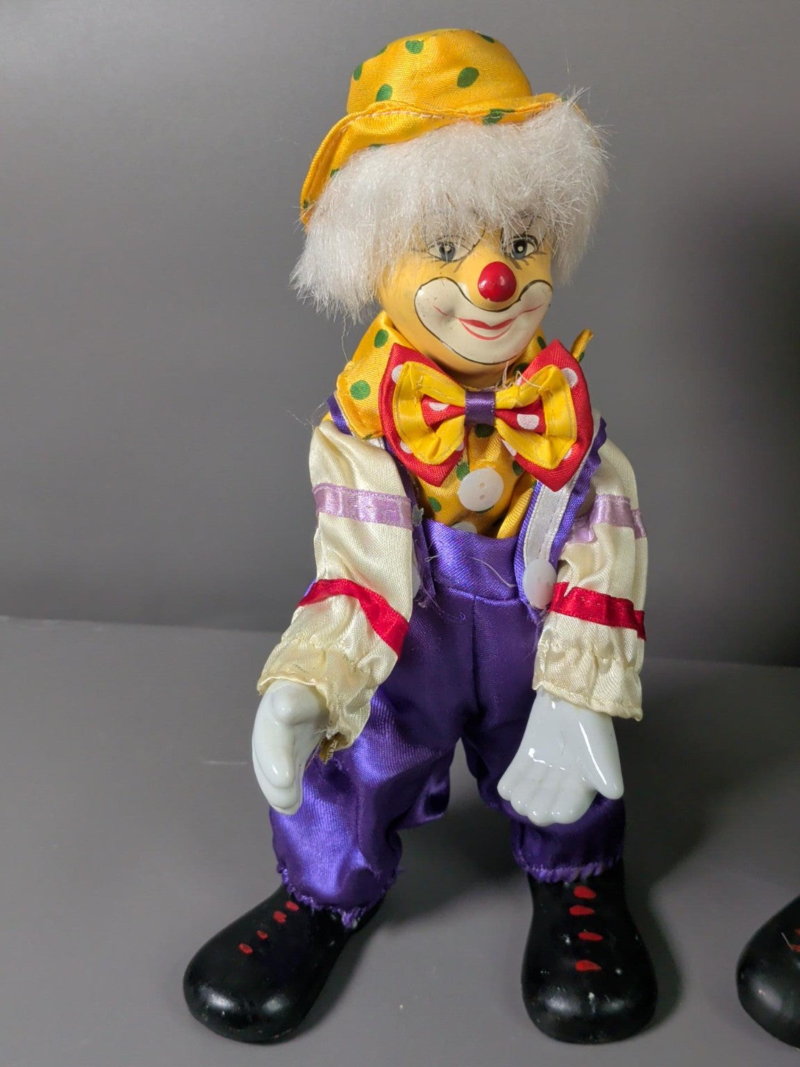 Pair of vintage colourful clown dolls - condition and detail