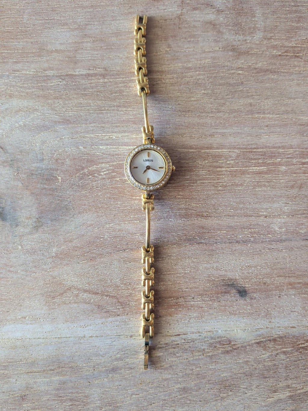 Lorus ladies gold-tone crystal bezel watch
