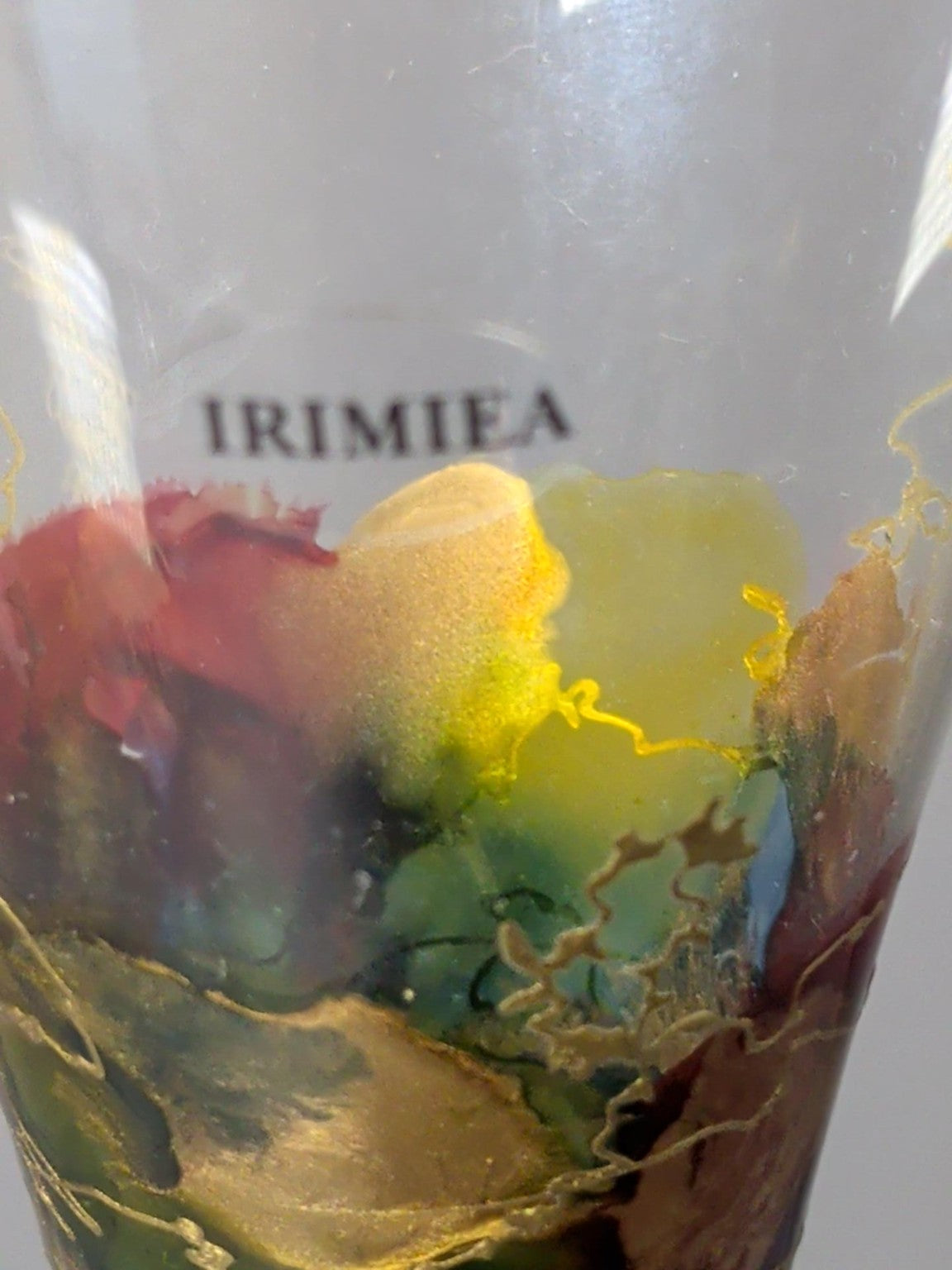 Irimea maker mark on art glass flute