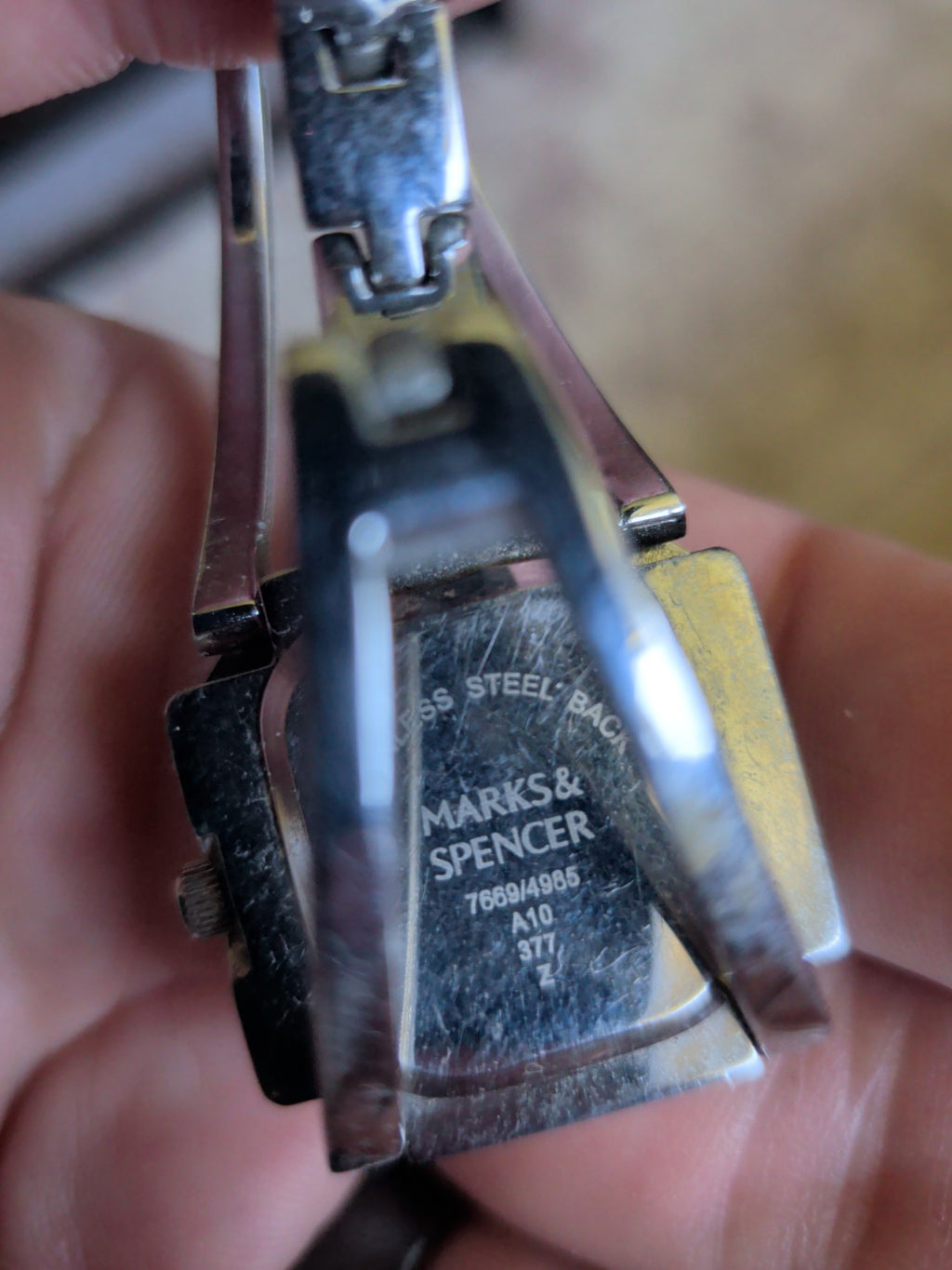 Marks & Spencer rectangular watch stainless steel back with reference markings