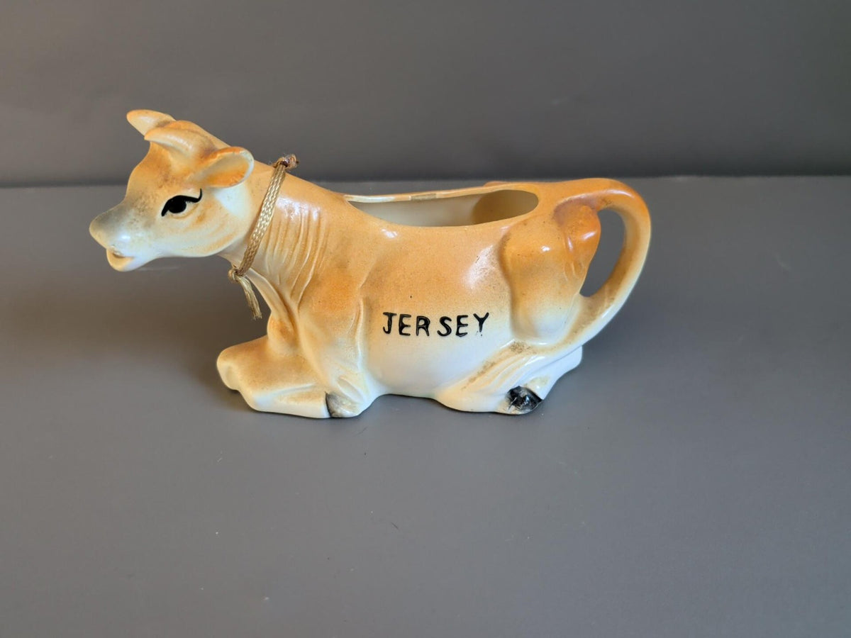 Vintage ceramic Jersey cow creamer jug in tan and cream glaze