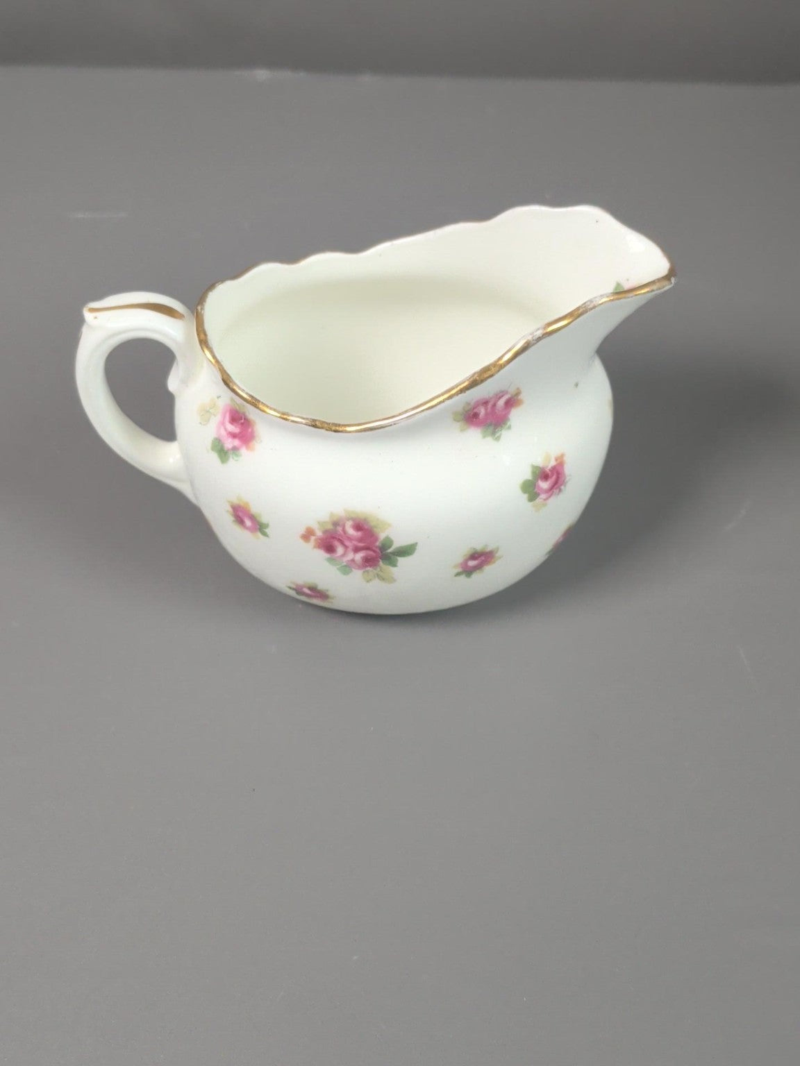 Royal Doulton floral rose cream jug side view