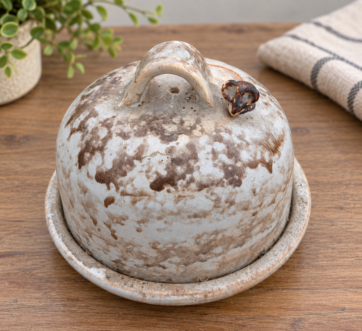 Rustic speckled ceramic covered butter dish with mouse detail