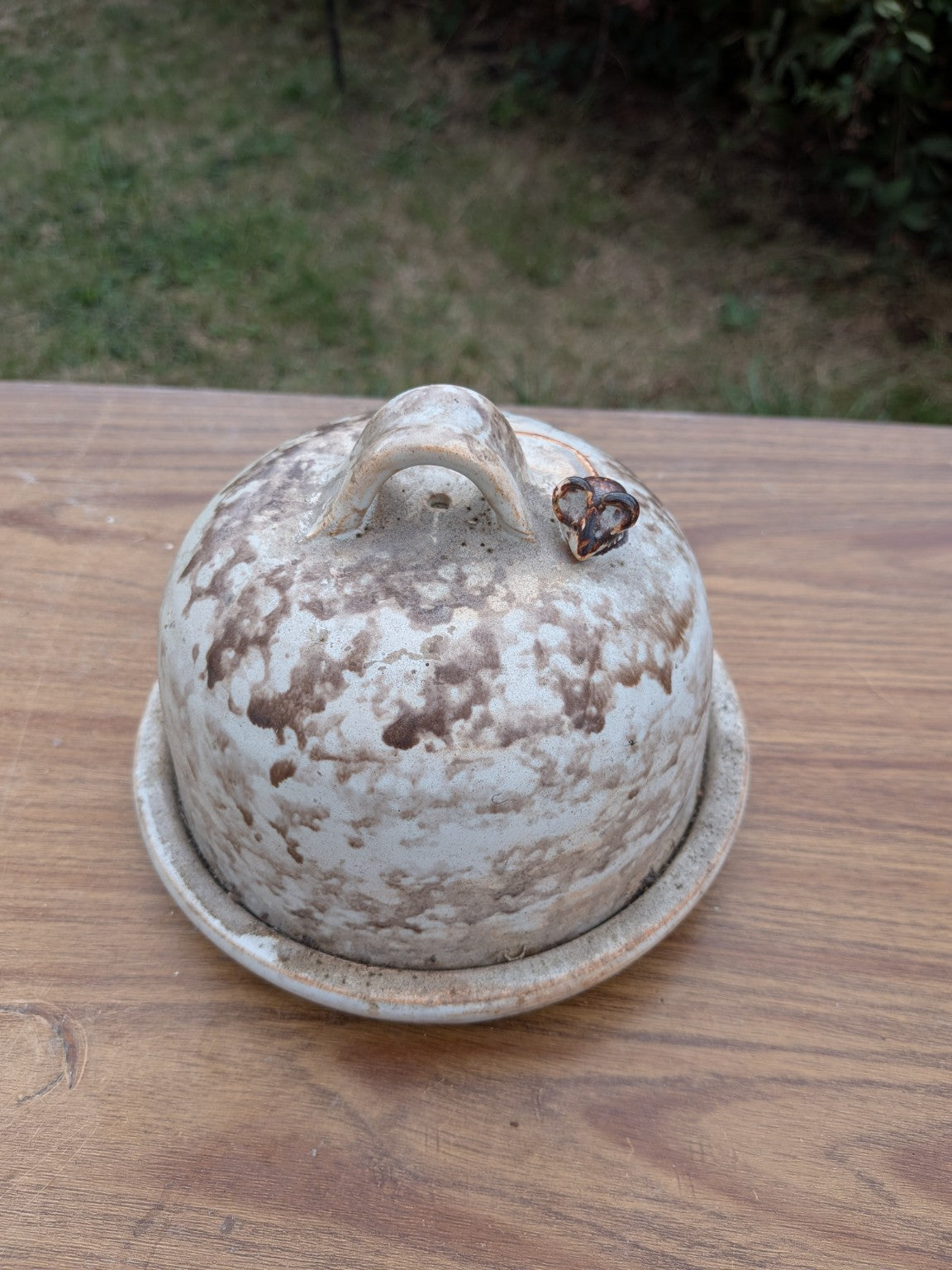 Original view of rustic ceramic covered butter dish