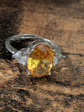 Amber-yellow oval stone adjustable ring front