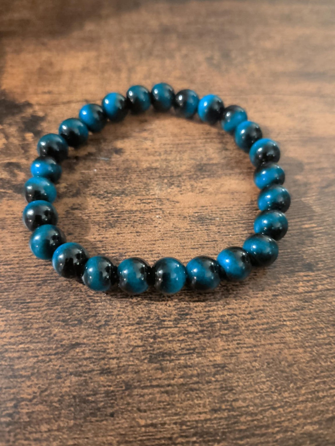Blue and black round beaded stretch bracelet