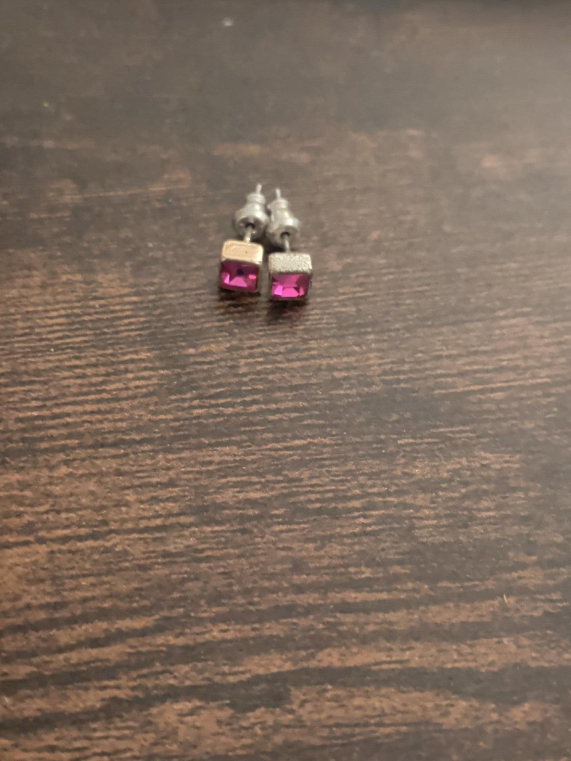 Pair of pink square stone silver-tone stud earrings