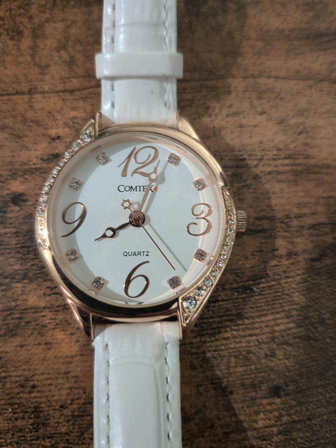 Actual white strap rose-gold-tone ladies quartz watch
