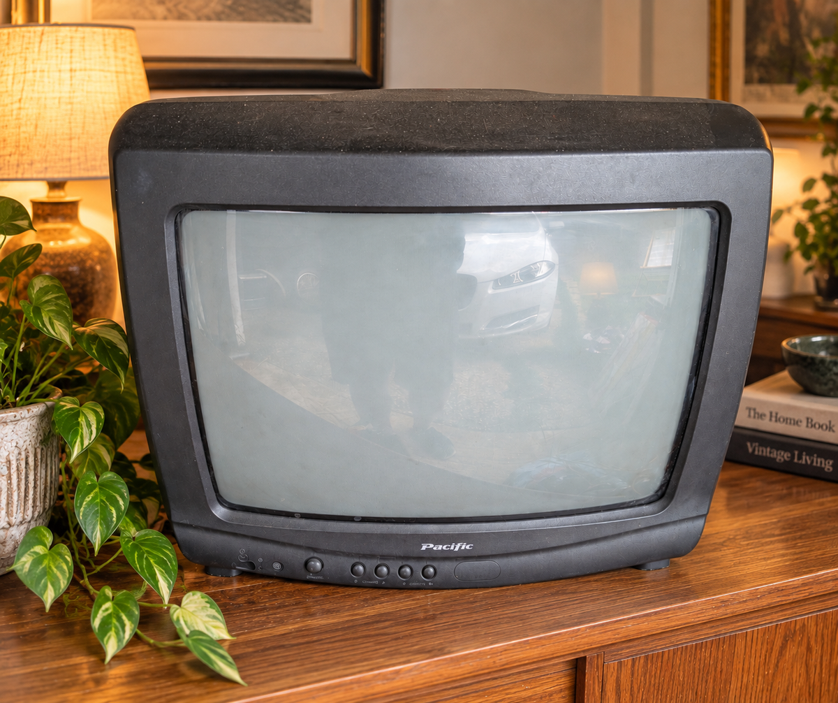 Vintage Pacific CRT television styled in a retro home interior