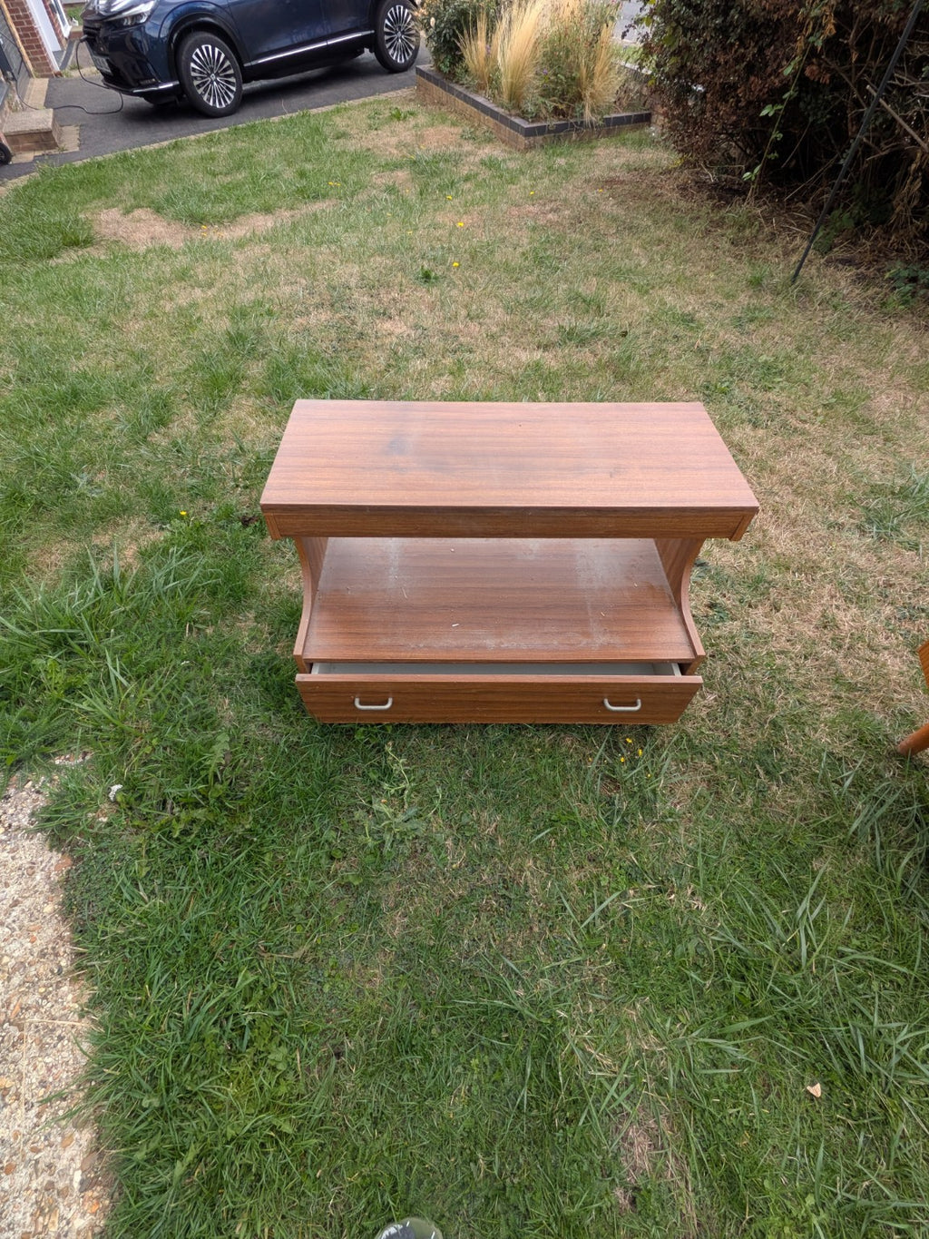 Original vintage wooden TV stand showing condition and wear