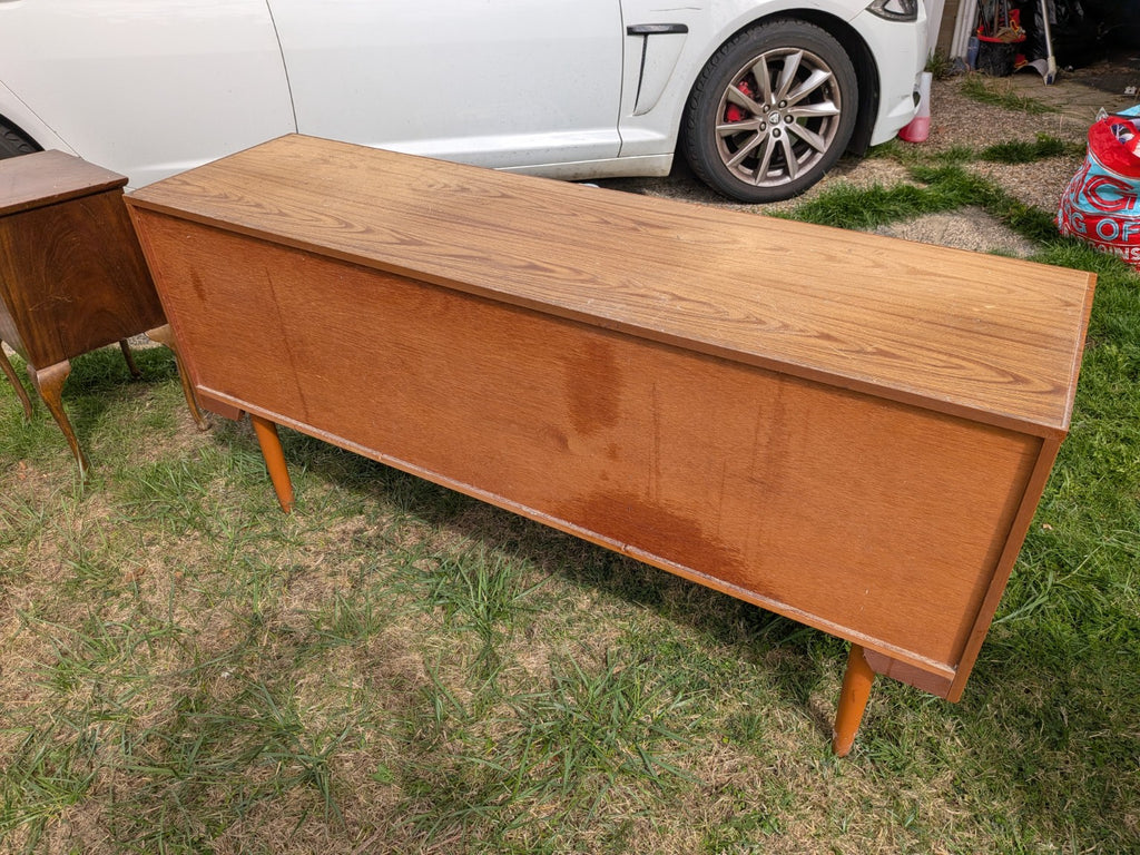 Actual rear view of vintage sideboard