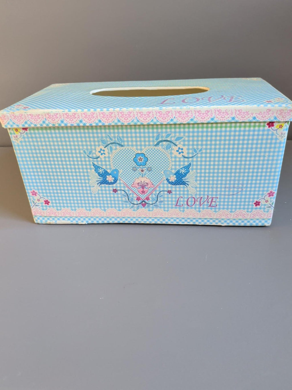Front view of blue gingham floral LOVE metal tissue box cover