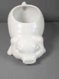 White ceramic pig planter front view