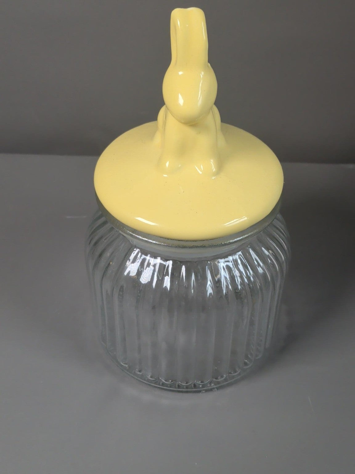 Yellow rabbit ceramic lid glass storage jar front view